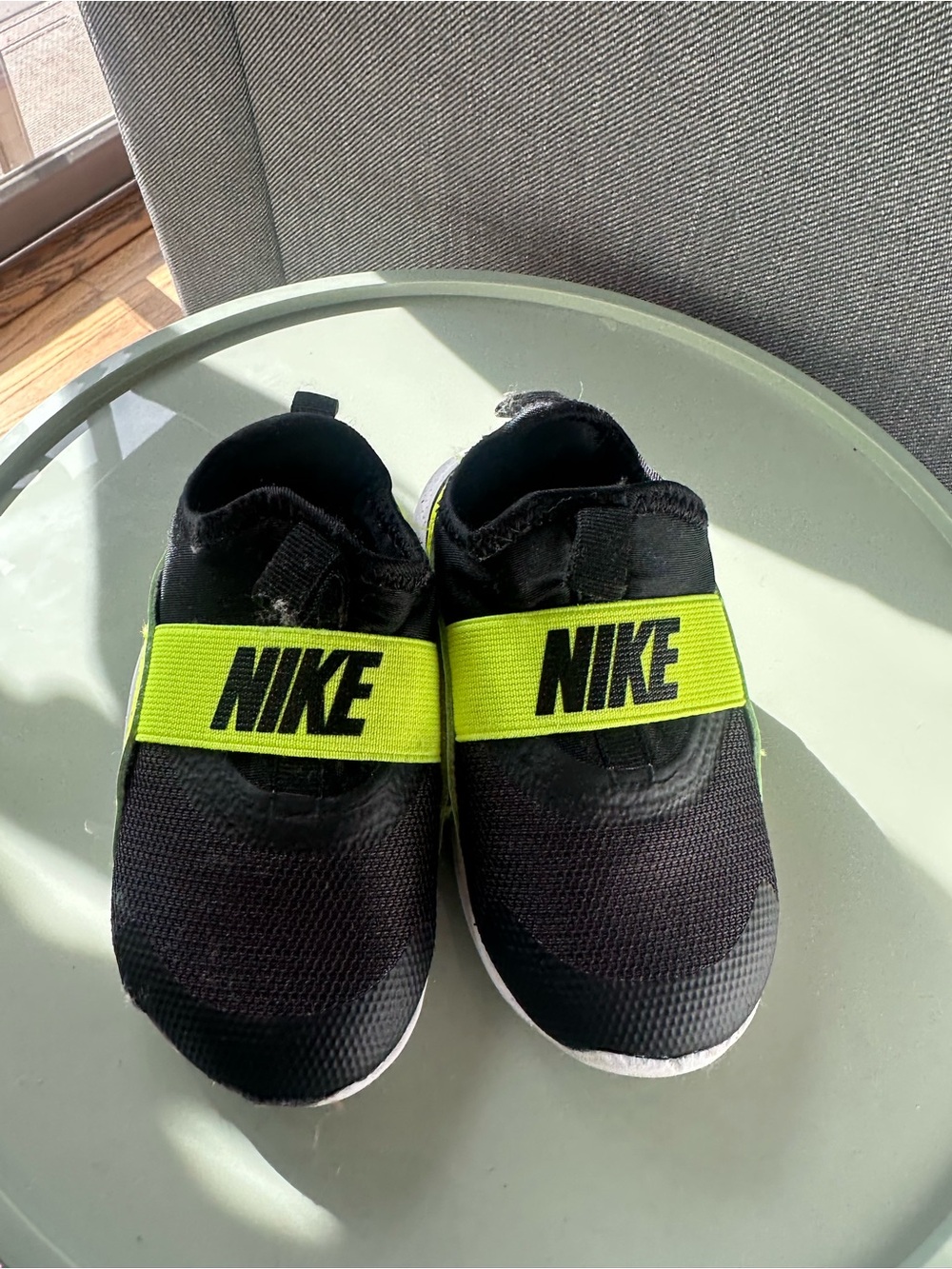 Nike Kids Slip-On Sneakers in Black and Neon Yellow Strap